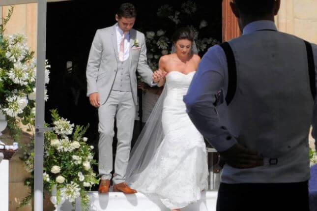 Janet Bruce's son, Alex with his bride, Lucy during their wedding.